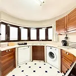 Out - T1 Oura Apartman